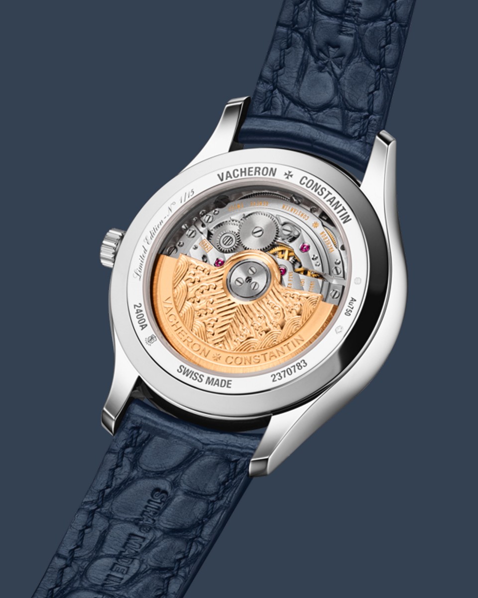 A sophisticated wristwatch with a black leather strap and luxurious details