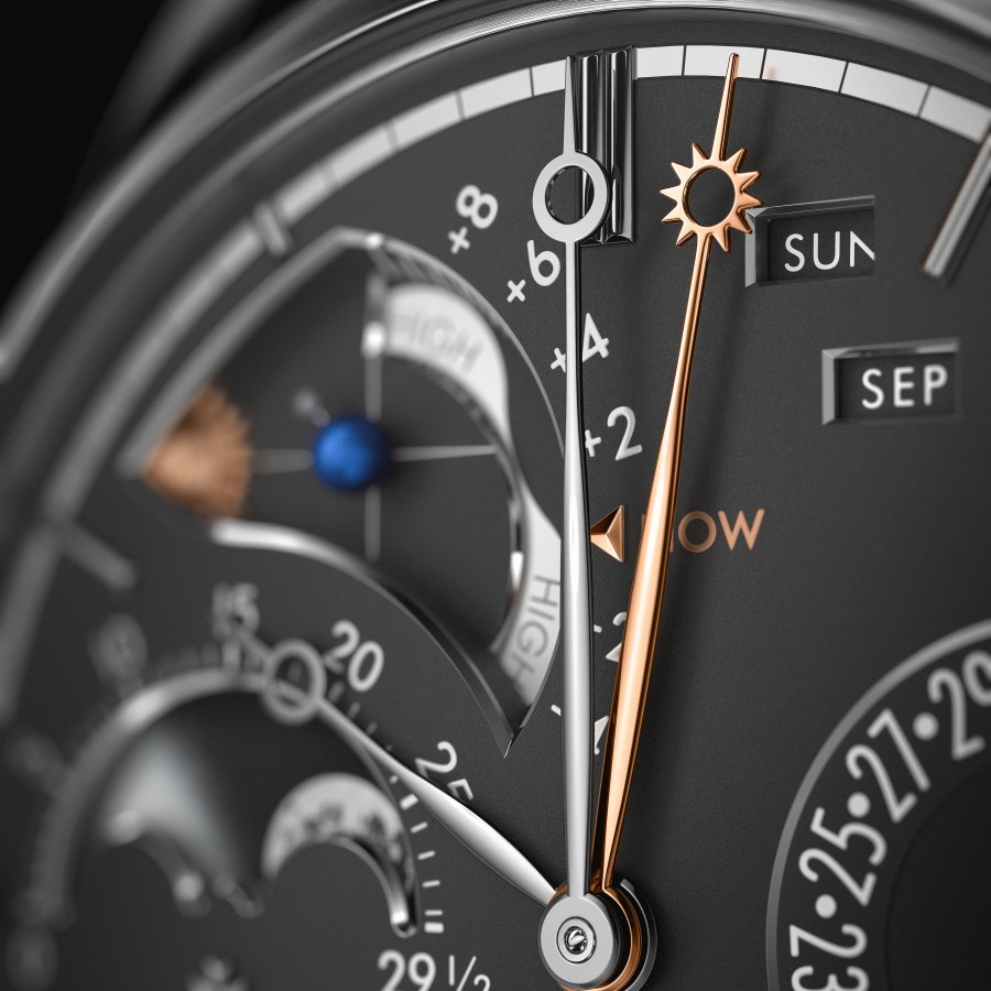 Black watch background with gold and silver details, close-up view