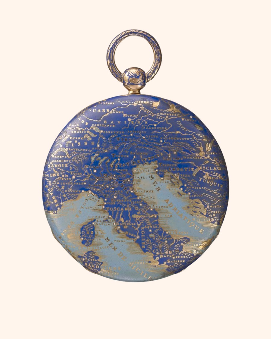 A pocket watch with a detailed map of Europe on its cover, featuring gold text on a blue background.