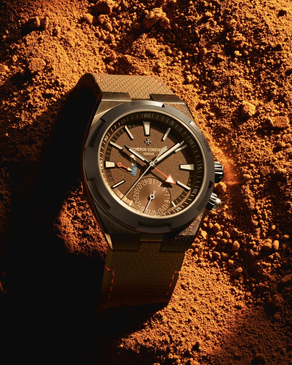 Brown Overseas watch on orange sand