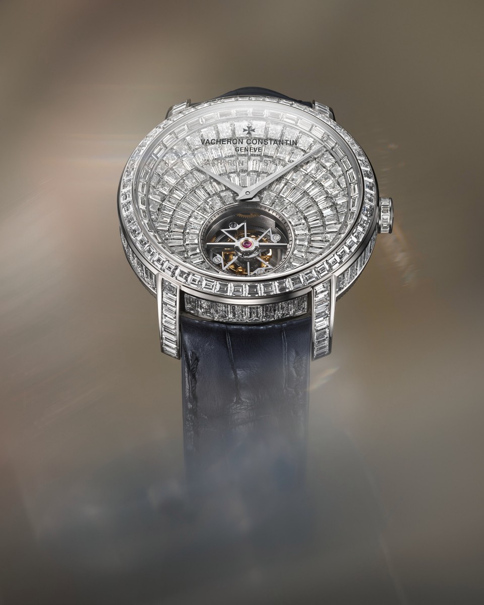  High jewerly watch fully set with baguette-cut diamonds and visible tourbillon.